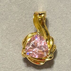 Large Pink/Lavender Cubic Zirconia UTC CZ
Trillion Gold Sterling Silver …